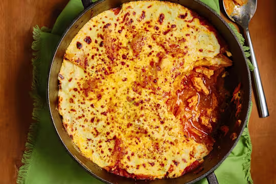 One Pan Quorn Vegetarian Chicken Lasagne with a small slice missing to show the filling.