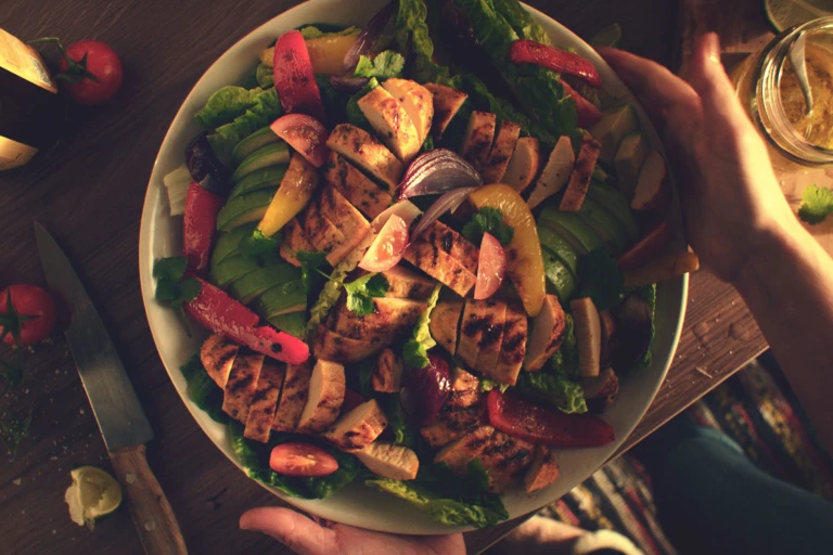 Quorn Veggie Fajita Salad, made with Quorn Fillets, peppers, avocado, tomatoes, onion and lettuce, served in a bowl