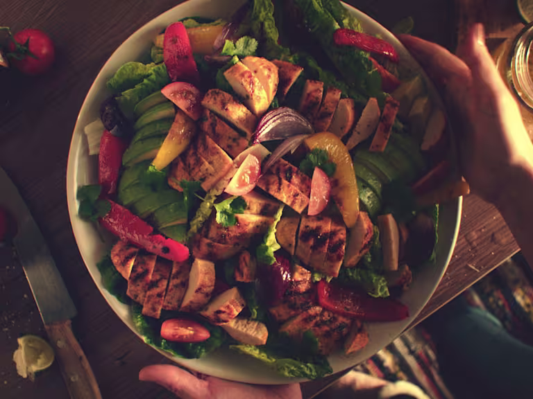 Quorn Veggie Fajita Salad, made with Quorn Fillets, peppers, avocado, tomatoes, onion and lettuce, served in a bowl