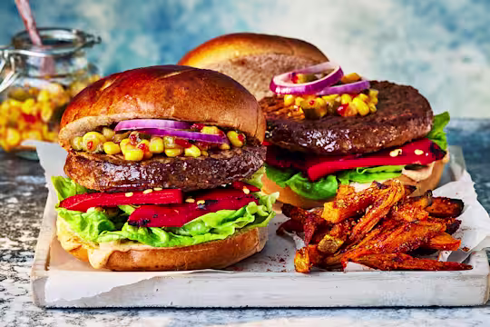 Quorn Vegetarian Quarter Pounder Burger with seasoned fries and pickled onion