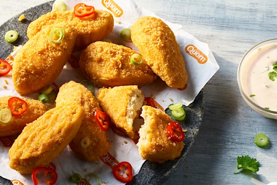 Quorn Buffalo Wings with chopped chillis, fresh coriander and a cool ranch dipping sauce