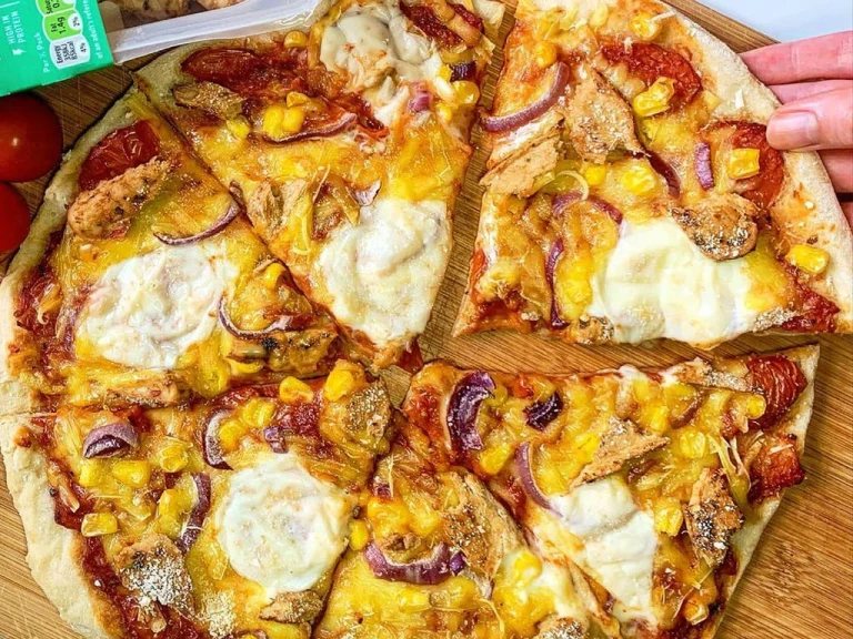 Vegan pizzas topped with vegan cheese, Quorn Sweet Chilli Mini Fillets, onions and sweetcorn.