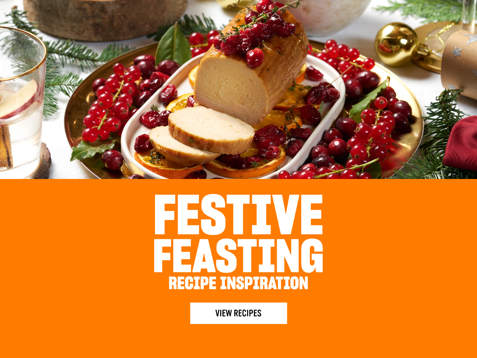A festive dish featuring a sliced roast topped with cranberries and herbs, surrounded by red currants, cranberries, and side dishes in the background and ‘Festive Feasting’ text on the right.