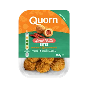 A packet of Quorn Sweet Chilli Bites showing the prepared product and information on an orange and sage green background.