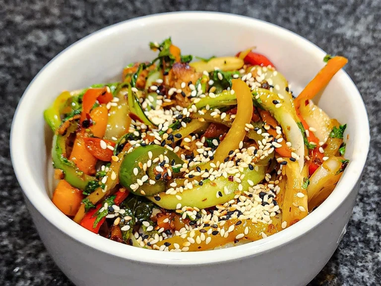 Asian-Style Quorn vegetarian Stir fry in a bowl sprinkled with sesame seeds. 