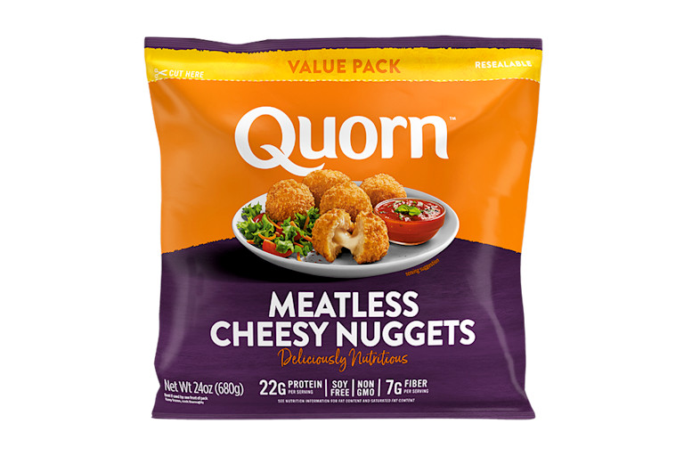 A box of Quorn Meatless Cheesy Nuggets showing the plated product and information on an orange and charcoal background.