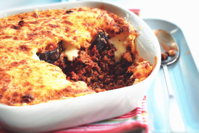 Vegetarian Moussaka with Aubergines, made with Quorn Mince, tomato, parmesan, greek yoghurt, herbs and spices, served in a lasagne dish.
