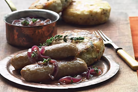 quorn sausages with onion gravy & mustard champ rissoles vegetarian recipe