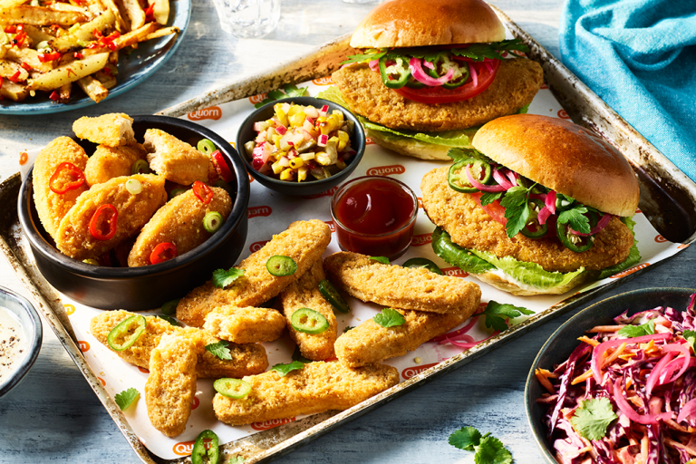 An array of Fakeaway meals including the Big Quorn Burger and Quorn Vegan Buffalo Nuggets with Blue Cheese Sauce.