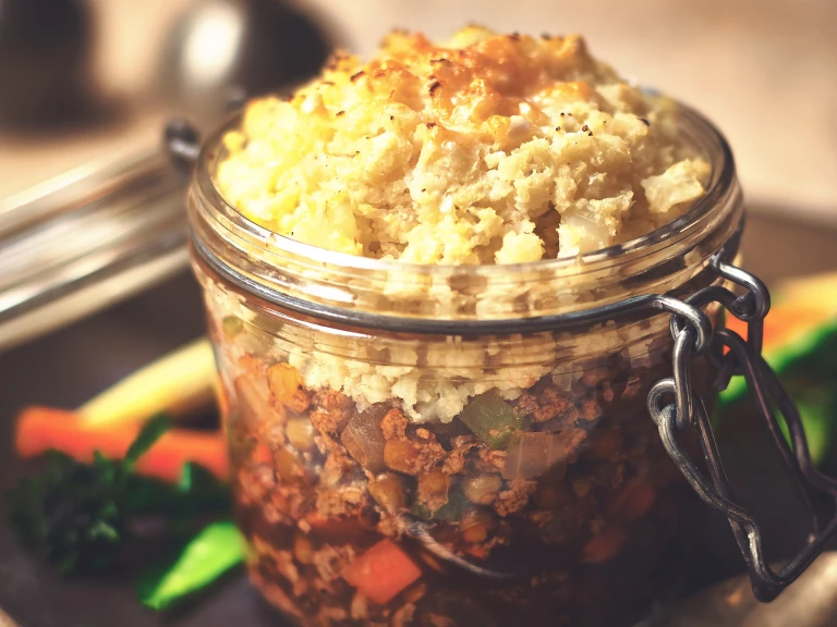 A Quorn Grounds shepherd's pie topped with cauliflower rice and made in a flip-top jar.