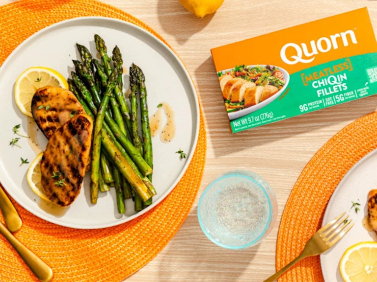 Quorn Vegetarian Fillets with asparagus and a slice of lemon next to Quorn ChiQin fillets packaging.
