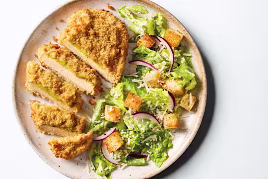 Quorn Pesto and Mozzarella Escalopes, served with caesar salad.