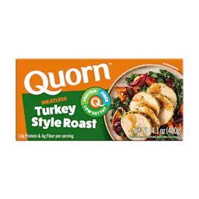 A box of Quorn Meatless Roast showing the product and the product information on an orange and charcoal background.