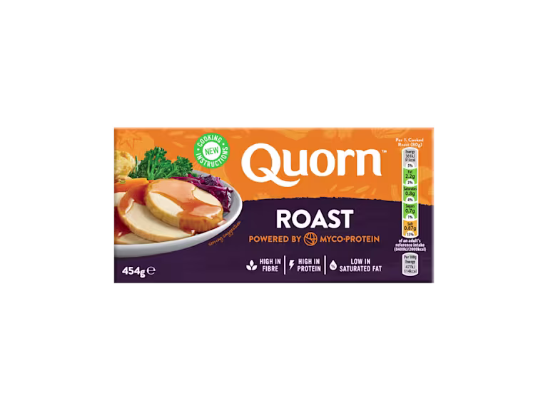A box of Quorn Roast showing the prepared product and information on an orange and charcoal background.