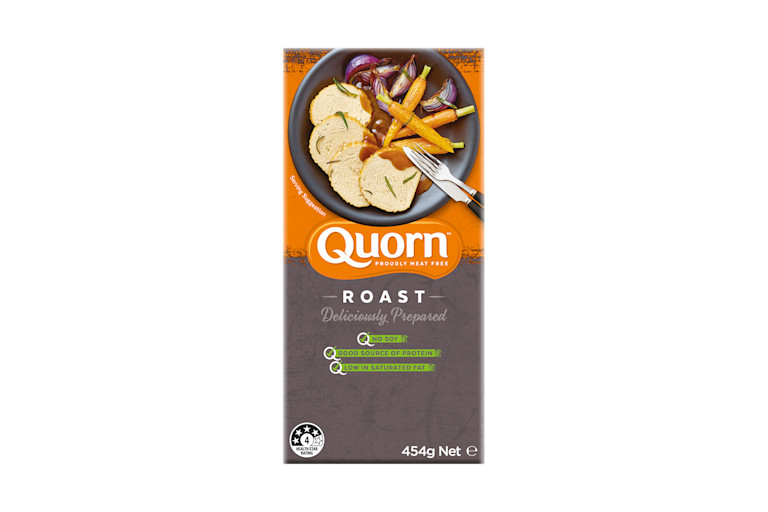 A box of Quorn Roast showing the prepared product and information on an orange and charcoal background.