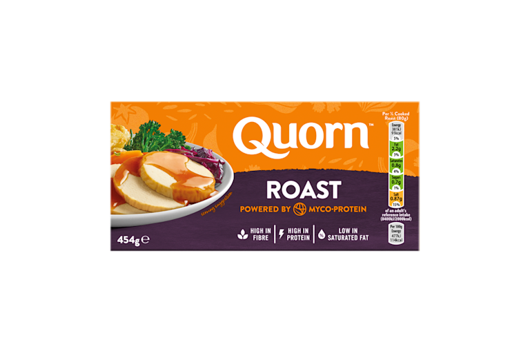 A box of Quorn Roast showing the prepared product and information on an orange and charcoal background.