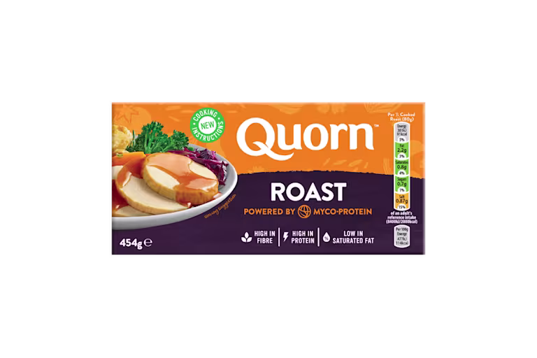 A box of Quorn Roast showing the prepared product and information on an orange and charcoal background.