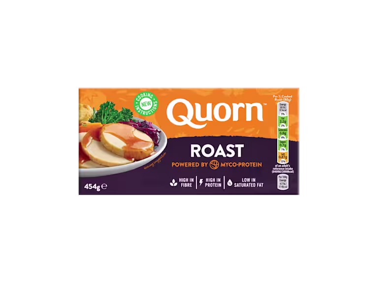 A box of Quorn Roast showing the prepared product and information on an orange and charcoal background.