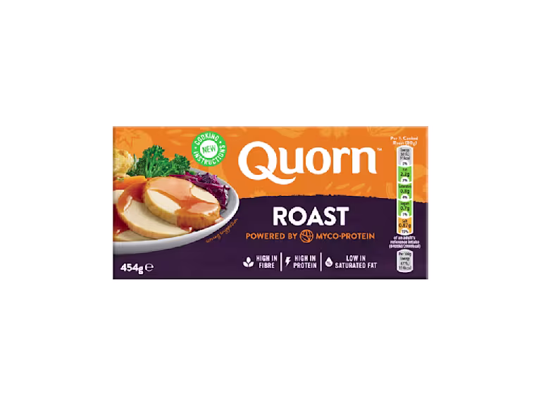A box of Quorn Roast showing the prepared product and information on an orange and charcoal background.
