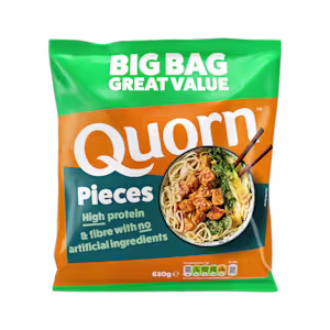 A bag of Quorn Pieces showing the prepared product and information on an orange and charcoal background.