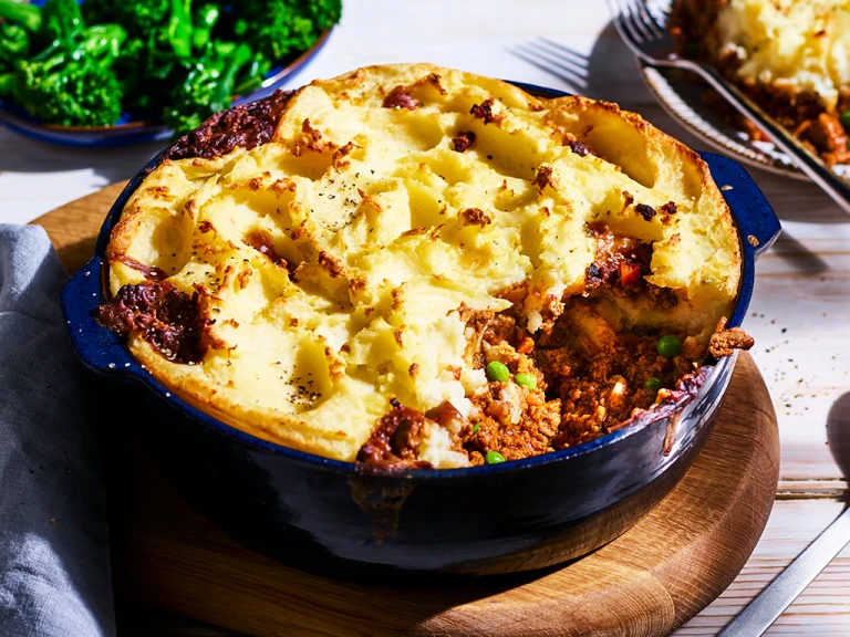 Quorn Vegetarian Cottage Pie, made with Quorn Mince, potato, carrots and peas, served on a plate