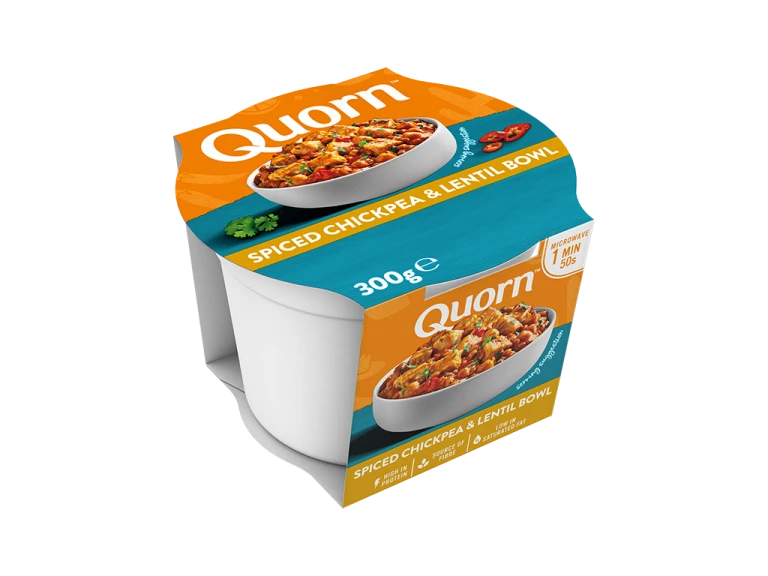 A Quorn Spiced Chickpea and Lentil Bowl in its packaging showing the prepared product and information on an orange and maroon background.