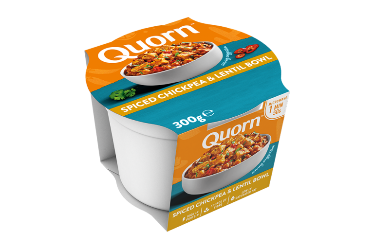 A Quorn Spiced Chickpea and Lentil Bowl in its packaging showing the prepared product and information on an orange and maroon background.