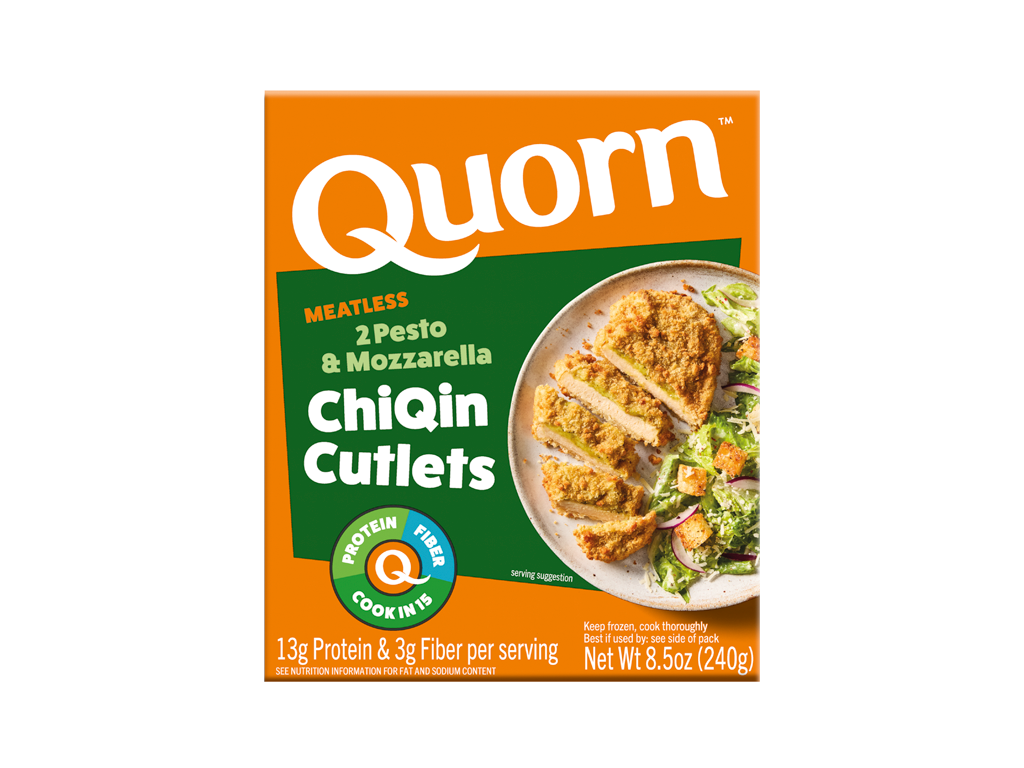 A box of Quorn Meatless Pesto & Mozzarella Cutlets showing the plated product and information on a charcoal and orange background.