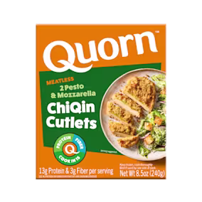 A box of Quorn Meatless Pesto & Mozzarella Cutlets showing the plated product and information on a charcoal and orange background.