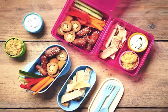 Vegetarian mezze picnic lunch with Quorn cocktail sausages, Quorn picnic eggs, fresh salads, dips and breads