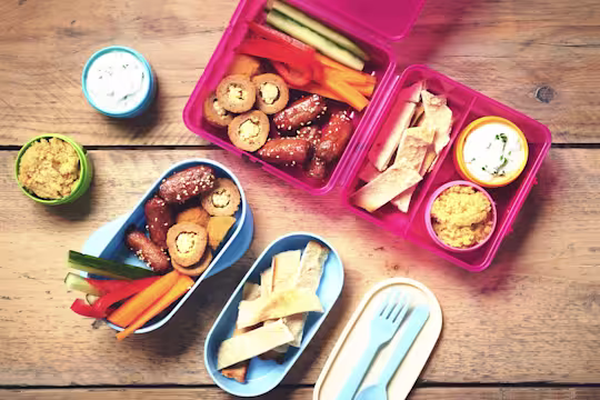 Vegetarian mezze picnic lunch with Quorn cocktail sausages, Quorn picnic eggs, fresh salads, dips and breads