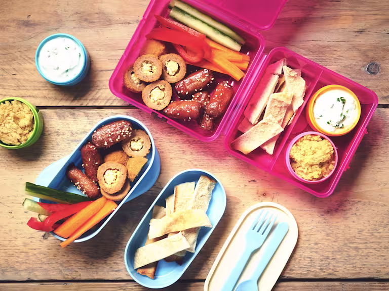 Vegetarian mezze picnic lunch with Quorn cocktail sausages, Quorn picnic eggs, fresh salads, dips and breads