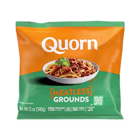 A bag and a box of Quorn Meatless Grounds showing the plated product and information on an orange and charcoal background.