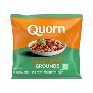 A bag and a box of Quorn Meatless Grounds showing the plated product and information on an orange and charcoal background.