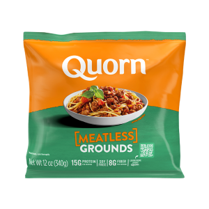 A bag and a box of Quorn Meatless Grounds showing the plated product and information on an orange and charcoal background.