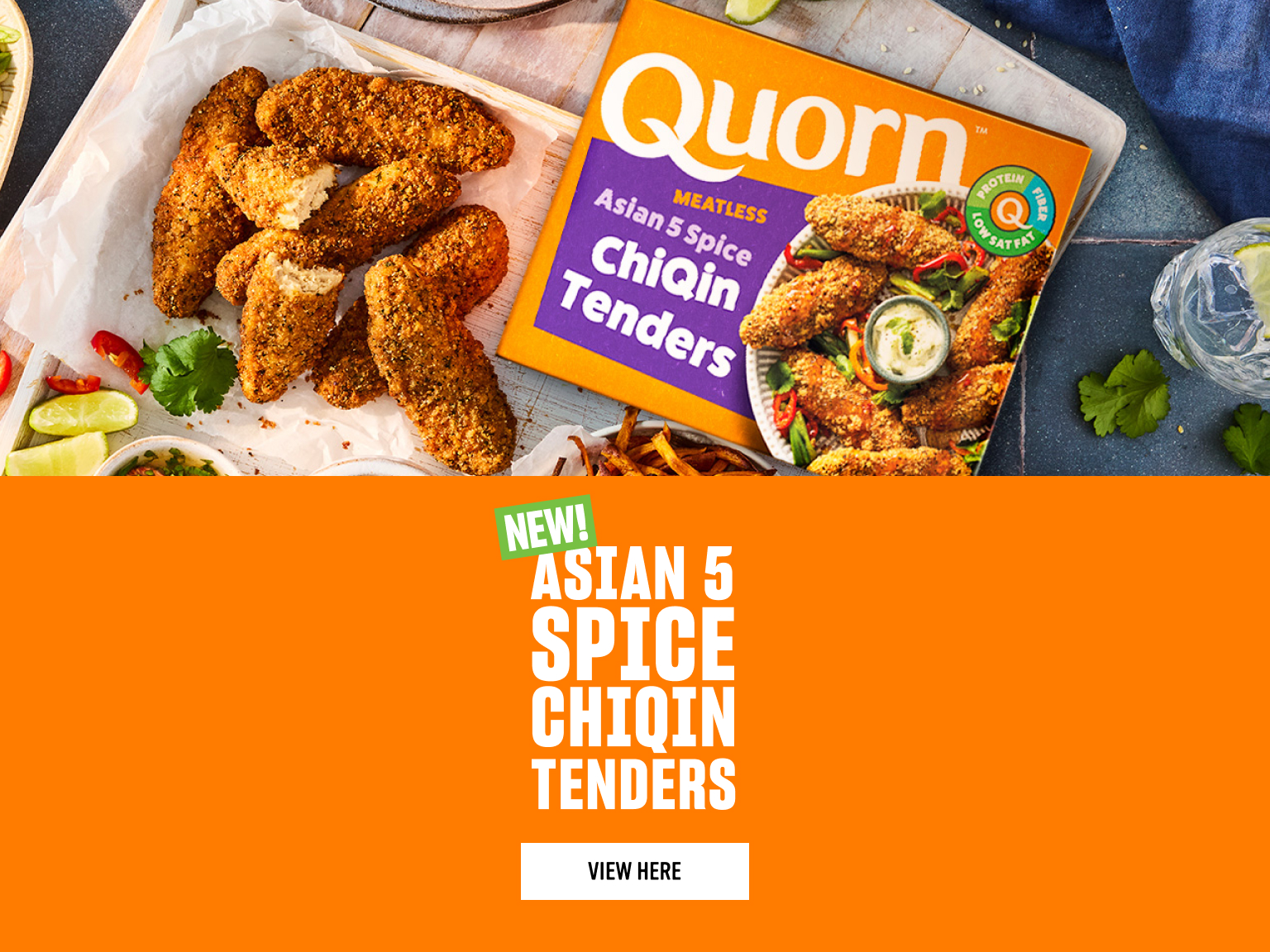 Quorn Asian 5 Spice ChiQin Tenders pictured with sweet potato fries, salad, lime wedges and dipping sauces. The product pack sits beside the tenders, with an orange panel reading “NEW! Asian 5 Spice ChiQin Tenders” and a “View Here” button.