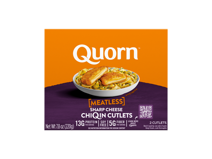 A box of Quorn Meatless Sharp Cheese Cutlets showing the product and product information on an orange and charcoal background.