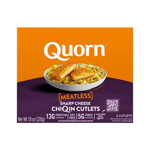 A box of Quorn Meatless Sharp Cheese Cutlets showing the product and product information on an orange and charcoal background.