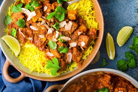 A large pot of quorn vegetarian rogan josh with some rice