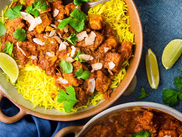 A large pot of quorn vegetarian rogan josh with some rice