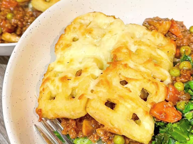 Cottage pie mix with Quorn Vegetarian Mince topped with mini potato waffles and cheese.