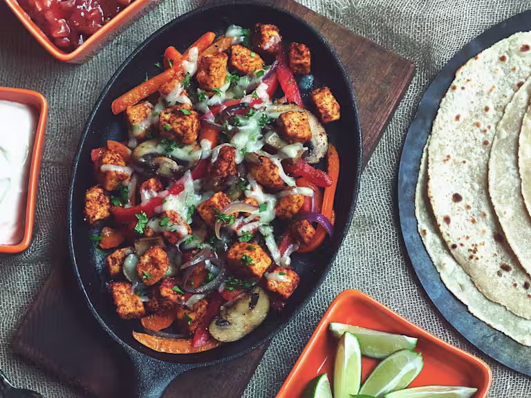 Quorn fajitas served in a black dish