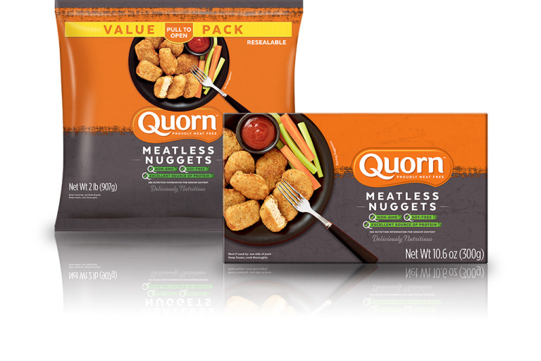 A box of Quorn Meatless Nuggets showing the plates product and information on an orange and charcoal background.