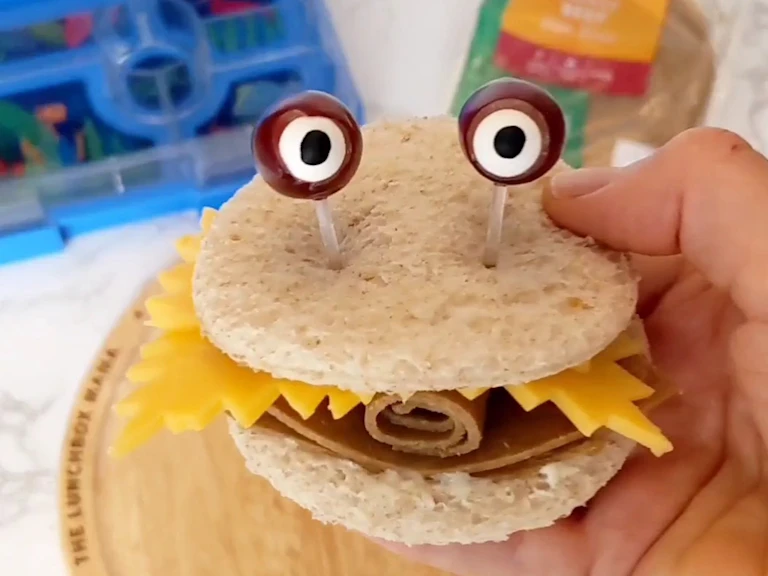 Cheese and Quorn Roast Beef Style Slices sandwich with eyes poking out the top