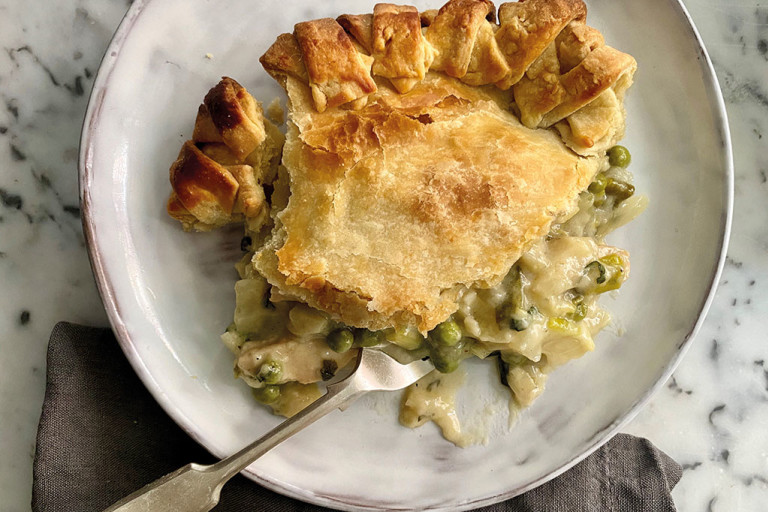 A generous serving of pie topped with shortcrust pastry and filled with Quorn Fillets, leeks, peas, and mint.