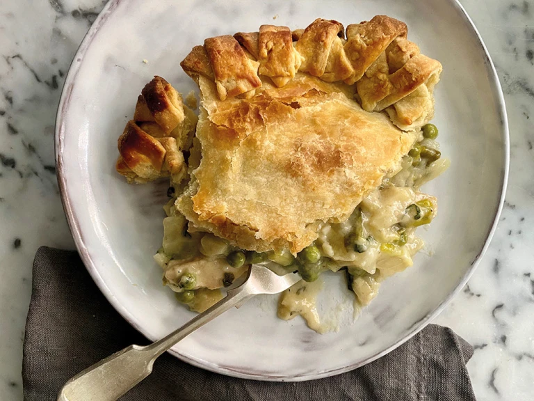 A generous serving of pie topped with shortcrust pastry and filled with Quorn Fillets, leeks, peas, and mint.