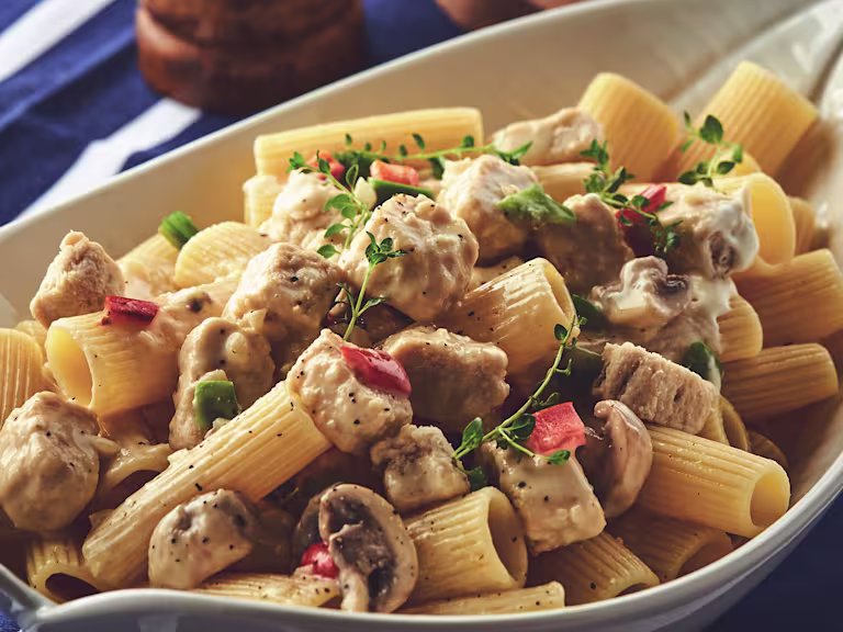 A close up of Quorn Meat-Free Pasta Alfredo served in a white dish.