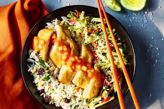 Sweer and sour Quorn Tempura Vegetarian Chicken fillets topped with a spring onion pineapple salsa sat on a bed of cashew rice.
