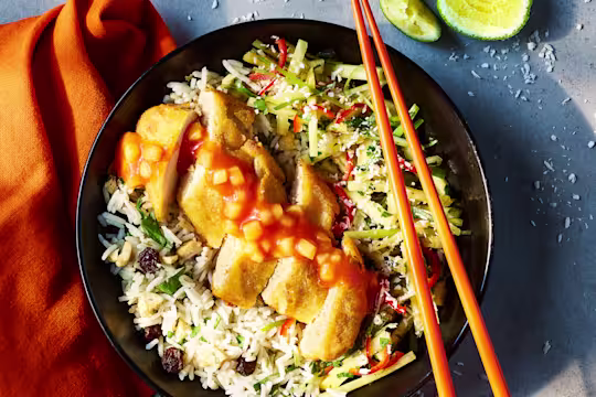 Sweer and sour Quorn Tempura Vegetarian Chicken fillets topped with a spring onion pineapple salsa sat on a bed of cashew rice.