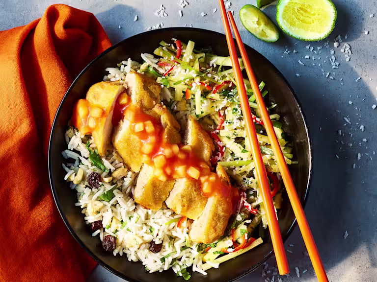 Sweer and sour Quorn Tempura Vegetarian Chicken fillets topped with a spring onion pineapple salsa sat on a bed of cashew rice.